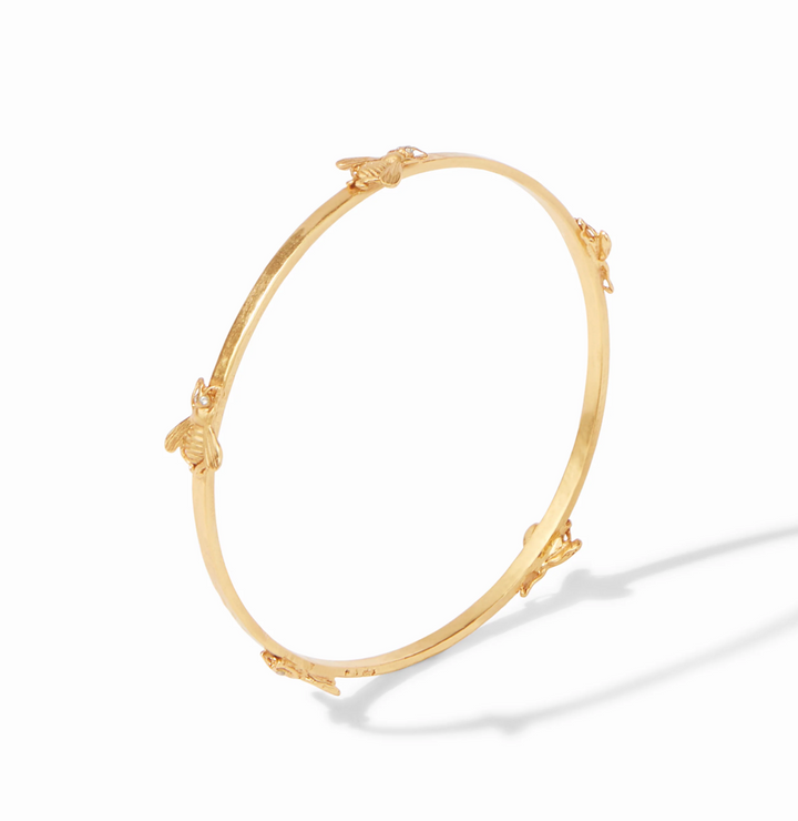 Julie Vos Bee Bangle, three-quarter product view showing bee stations and hammered band