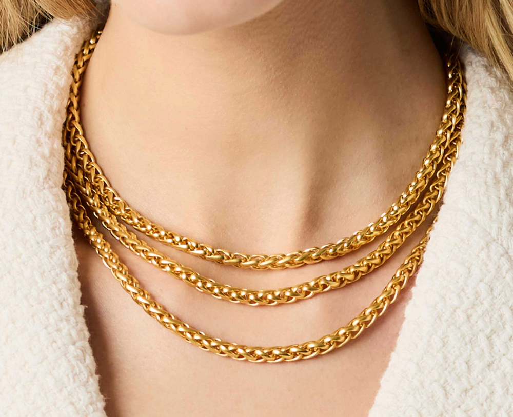 Julie Vos Cobblestone Link Necklace, on-model styled shot showing three chain lengths layered at the neckline.