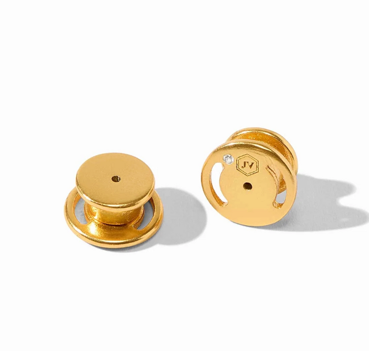Close-up of the earring backs for the Ravello Statement Hoop, showing the 24K gold plated post backing and Julie Vos hallmark with crystal accent.
