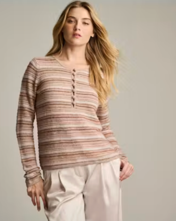 Front view of a woman wearing the Knit Happens Sweater in smokey oat, a striped knit sweater in blush and taupe tones with a button-front henley neckline.