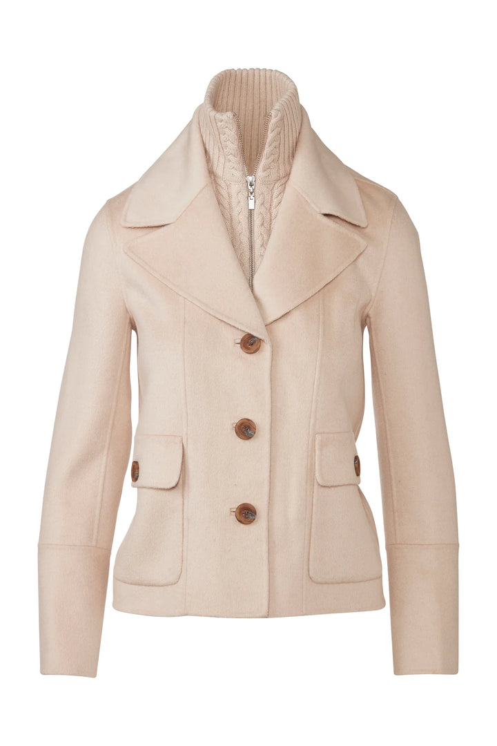 Flat lay of a sandstone wool-cashmere coat with notch collar, cable knit inset, and patch pockets.