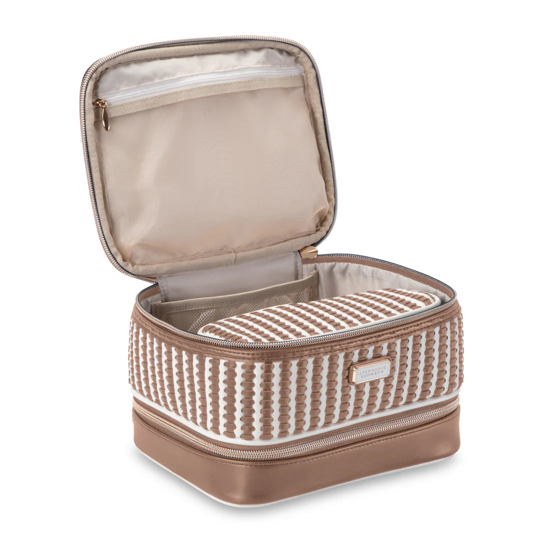 Open/interior view: Stephanie Johnson Jenny Train Case shown open, highlighting tan lining, zip mesh pocket in lid, and removable woven train case nested inside top compartment.