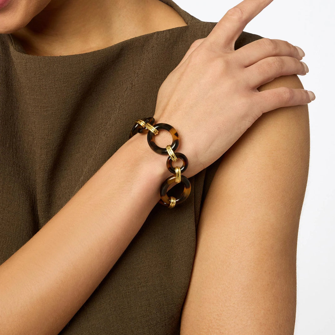 Julie Vos Madison Link Bracelet worn on wrist, alternating tortoiseshell acetate and hammered gold link silhouette