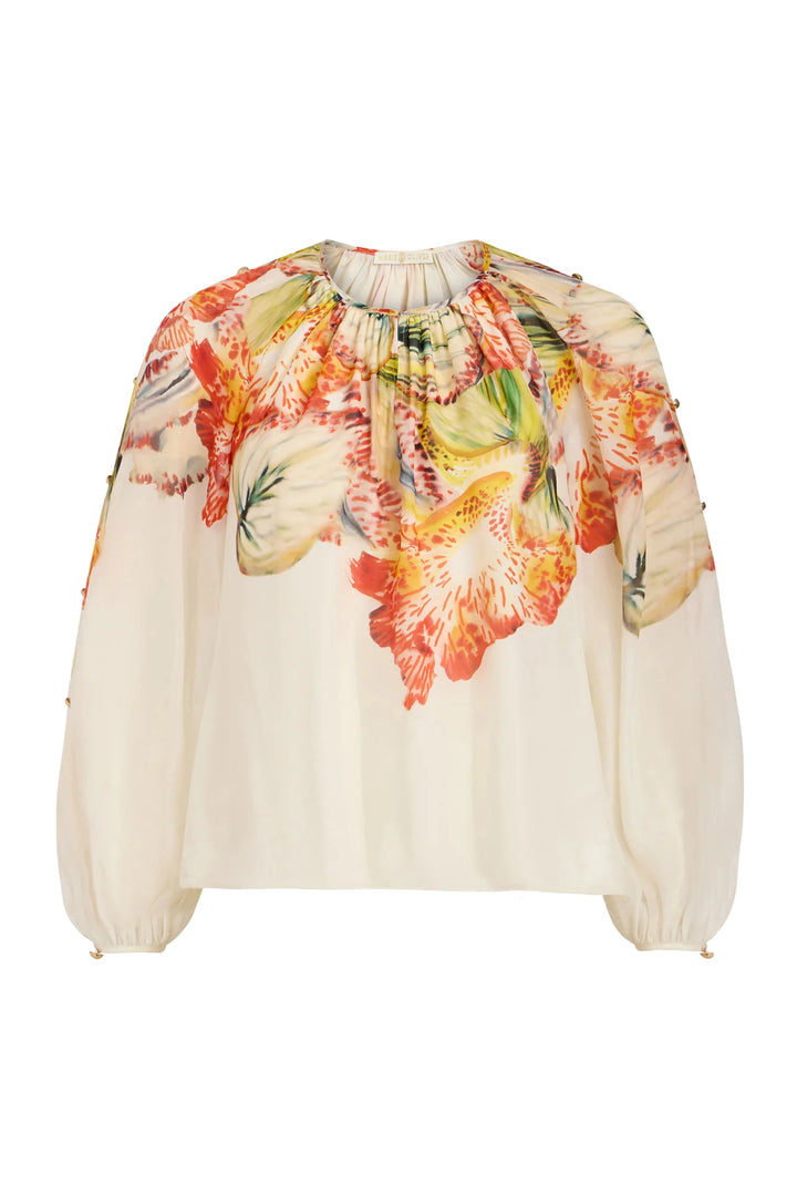Marie Oliver Arabella Blouse in ivory silk with Sonnet botanical placement print, gathered neckline, and gold button sleeve detail. - blouse only