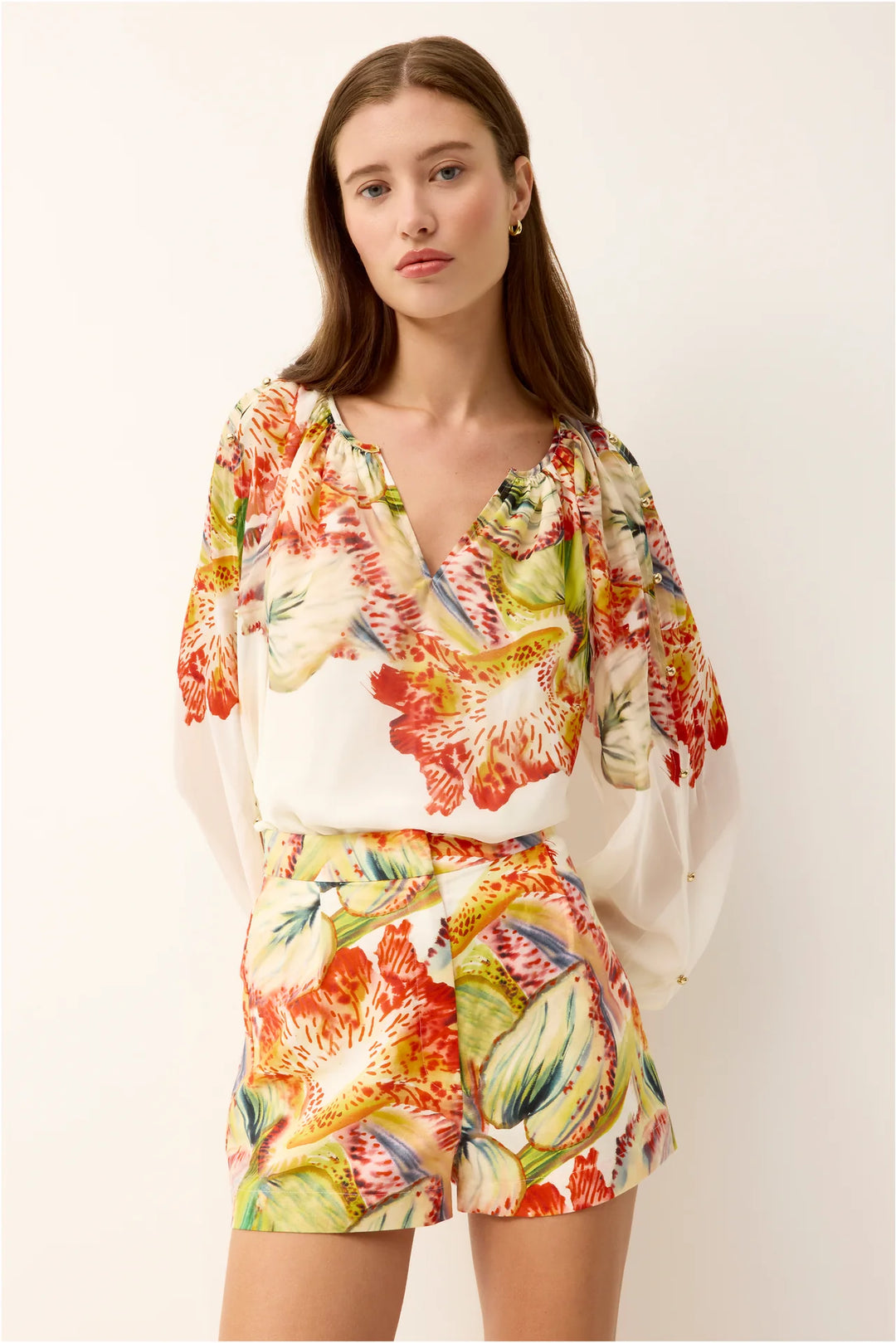 Marie Oliver Blanche Short in maximalist botanical floral print on linen-cotton blend with natural waist and fly closure.