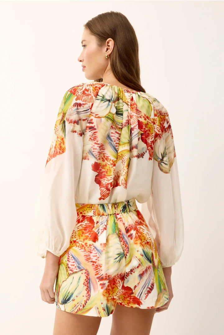 Marie Oliver Blanche Short in maximalist botanical floral print on linen-cotton blend with natural waist and fly closure shown as set - back side and up close