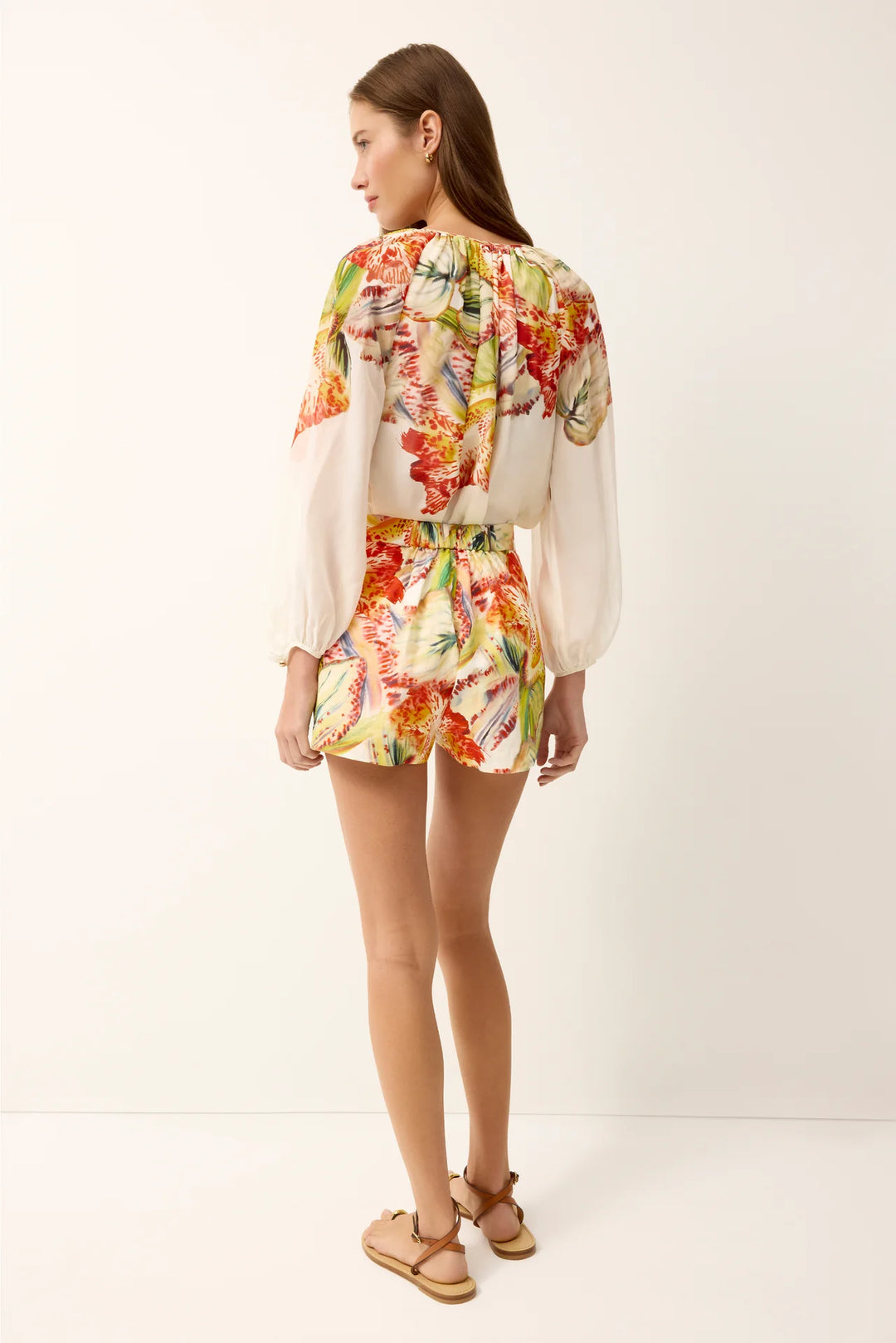 Marie Oliver Blanche Short in maximalist botanical floral print on linen-cotton blend with natural waist and fly closure shown as set - back side
