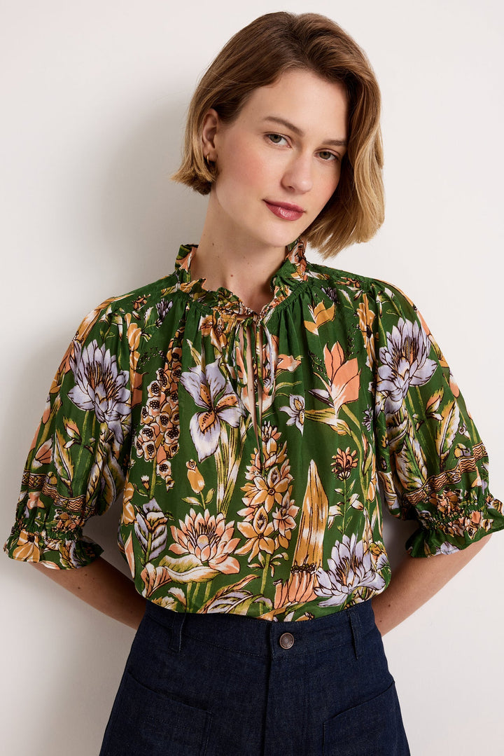 Marie Oliver Billie Blouse in Greenhouse — close-up front view showing collar ruffle and print detail