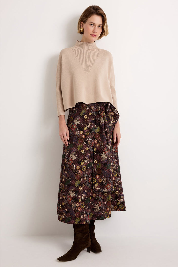 Marie Oliver Claudie Popover in Camel — front view styled with floral print wrap midi skirt