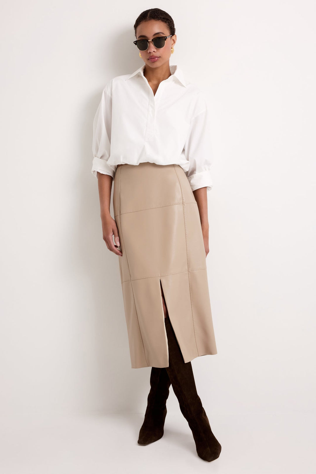 Marie Oliver Elliott Skirt in Oat — front view styled with white button-down and brown suede boots