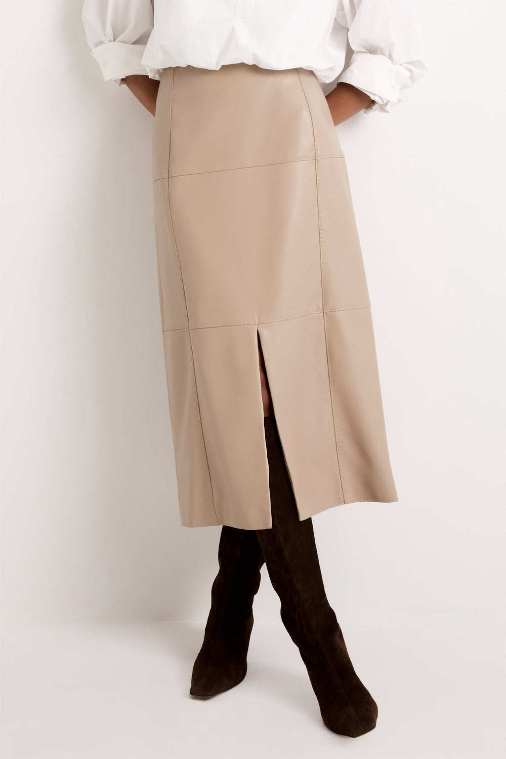 Marie Oliver Elliott Skirt in Oat — front detail view showing center slit and seam construction