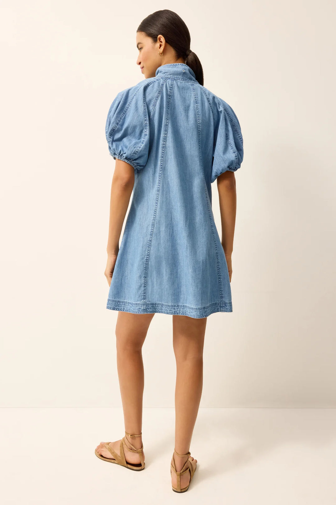 Marie Oliver Esther Dress in Light Wash — back on-model, full length showing puff sleeve and A-line silhouette