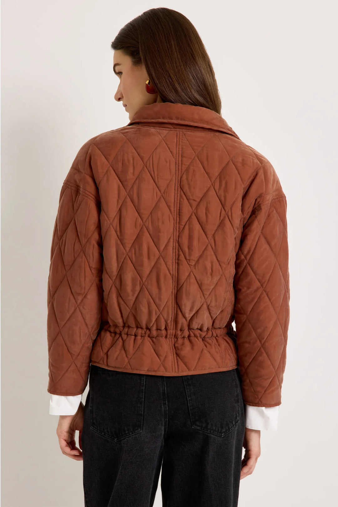 Marie Oliver Haisley Jacket in Tortoise, back view on model showing center back seam, dropped shoulders, and gathered drawstring waist