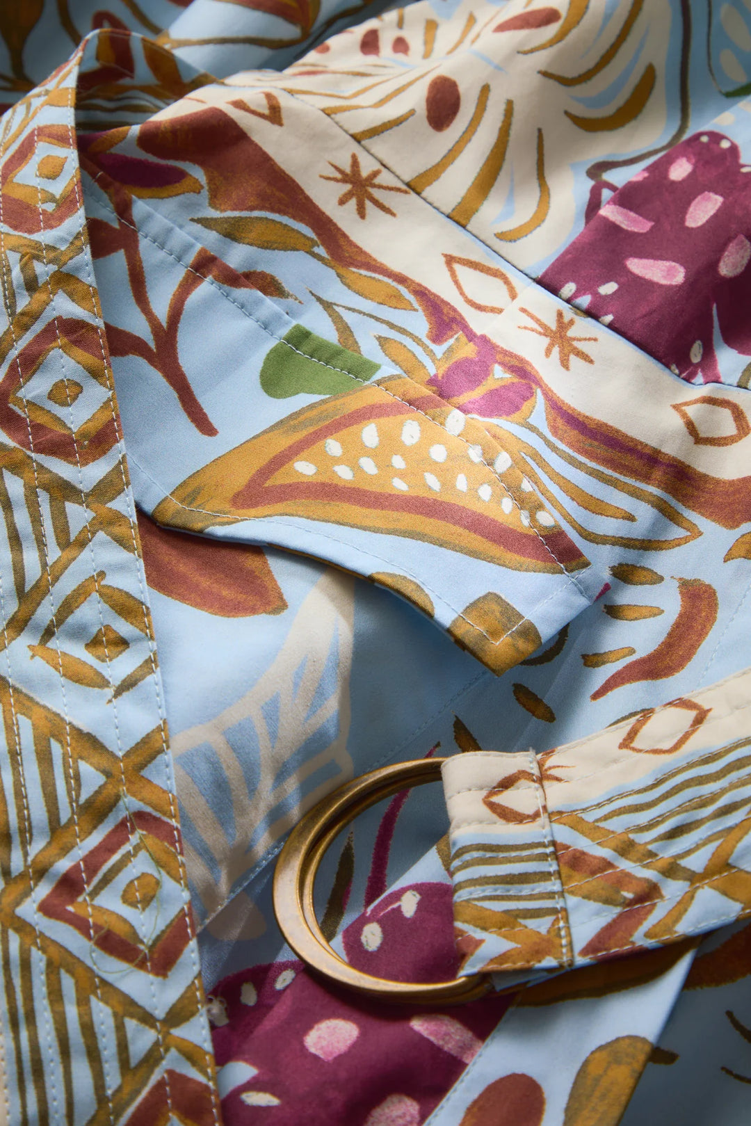 Marie Oliver Hughes Dress in Branche — detail close-up of D-ring belt buckle and trapunto stitching