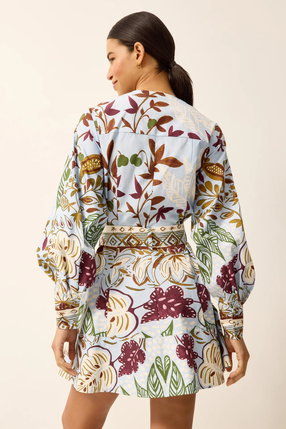 Marie Oliver Hughes Dress in Branche — back on-model, showing belt and skirt movement