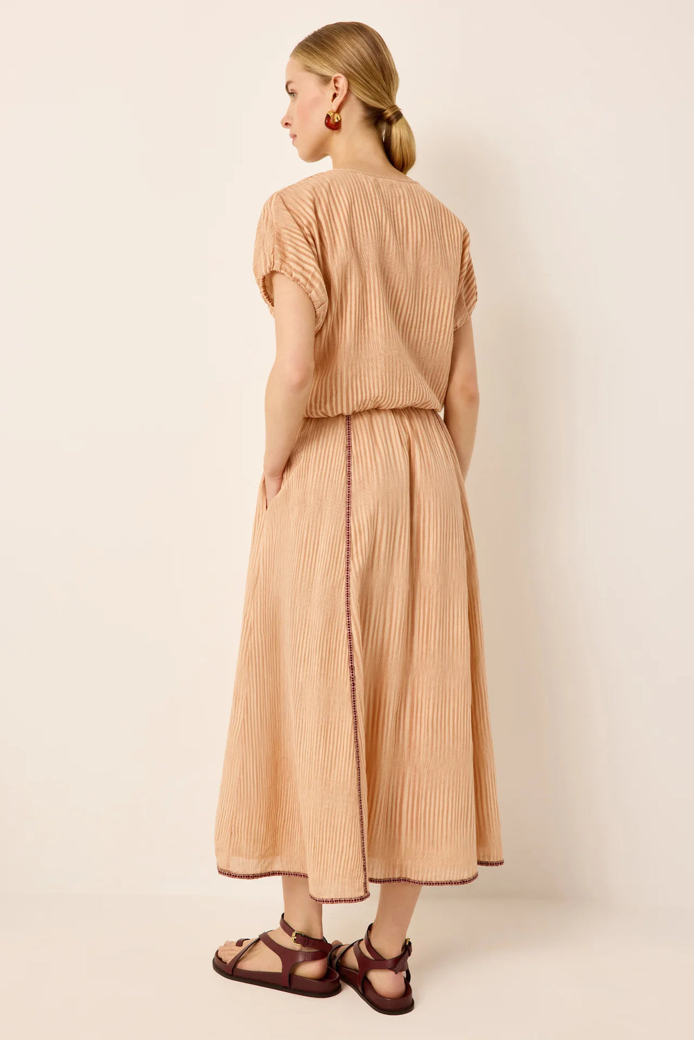 Marie Oliver Sasha Skirt in Siena — back on-model, full length, showing skirt movement