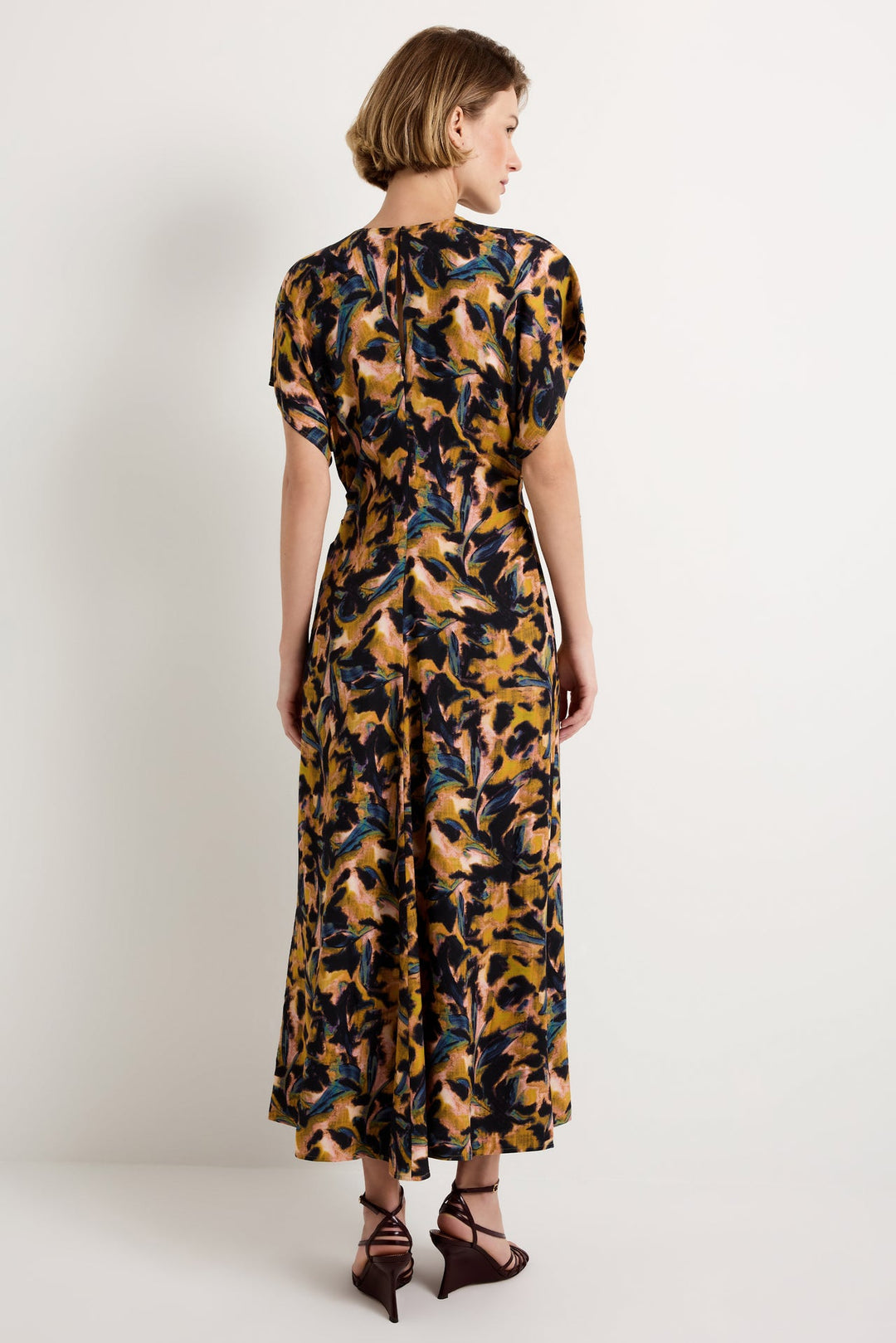 Marie Oliver Kamari Dress, Mellow print, back view, full length showing center back seam and A-line skirt silhouette.