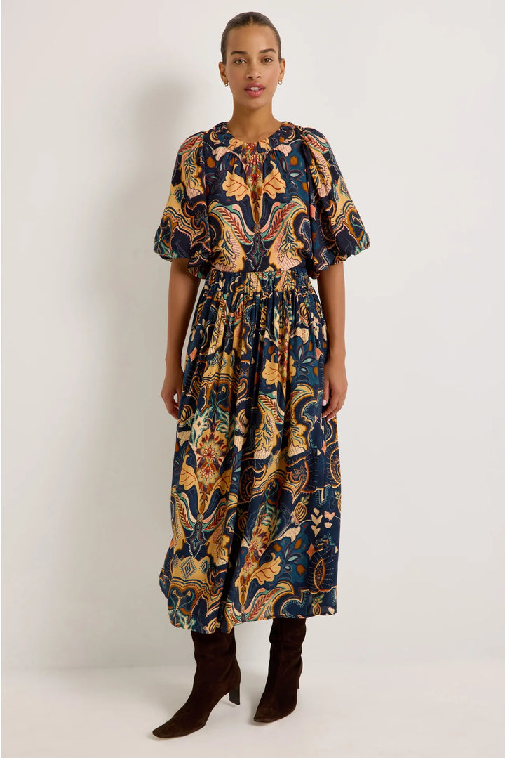 Marie Oliver Wren Top in Saddle, full-length front view on model, styled with the coordinating print midi skirt and dark brown suede knee-high boots