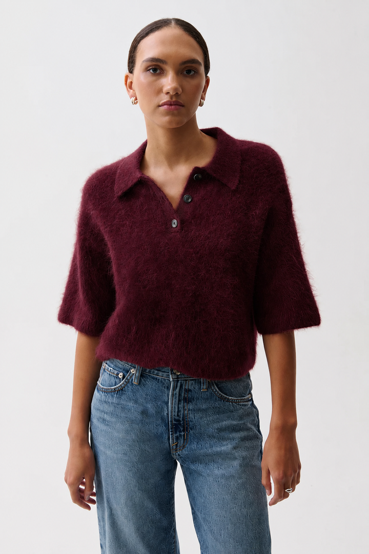 Pistola Nadya Alpaca Blend Boxy Polo Sweater in Cherry Wine, front view, model wearing wine-colored fuzzy polo sweater with light wash denim.