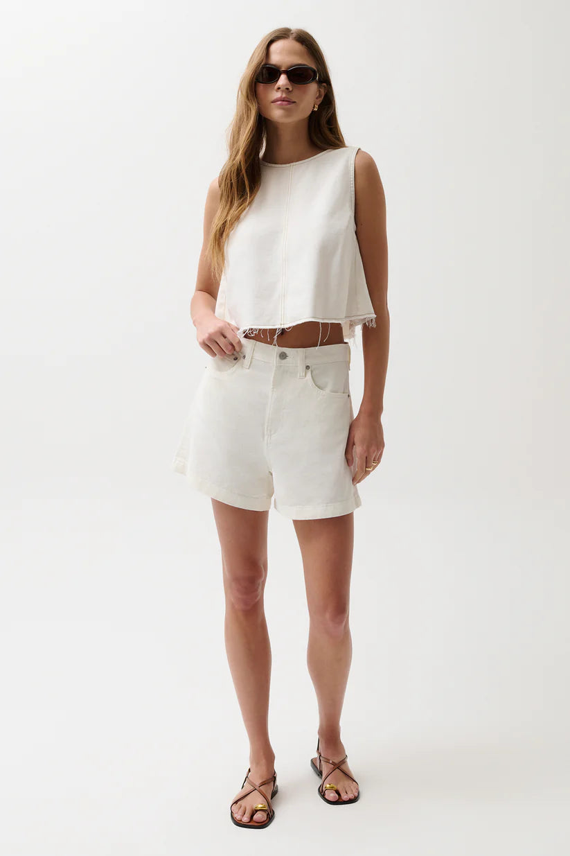 Pistola Kimora High Rise A-Line Short in Egret, white denim, high rise with cuffed hem and A-line silhouette, styled with cropped white tank and strappy sandals