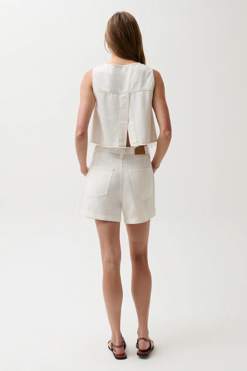 Pistola Kimora High Rise A-Line Short in Egret, white denim, full-length back view showing A-line silhouette and cuffed hem, styled with cropped white top and brown sandals