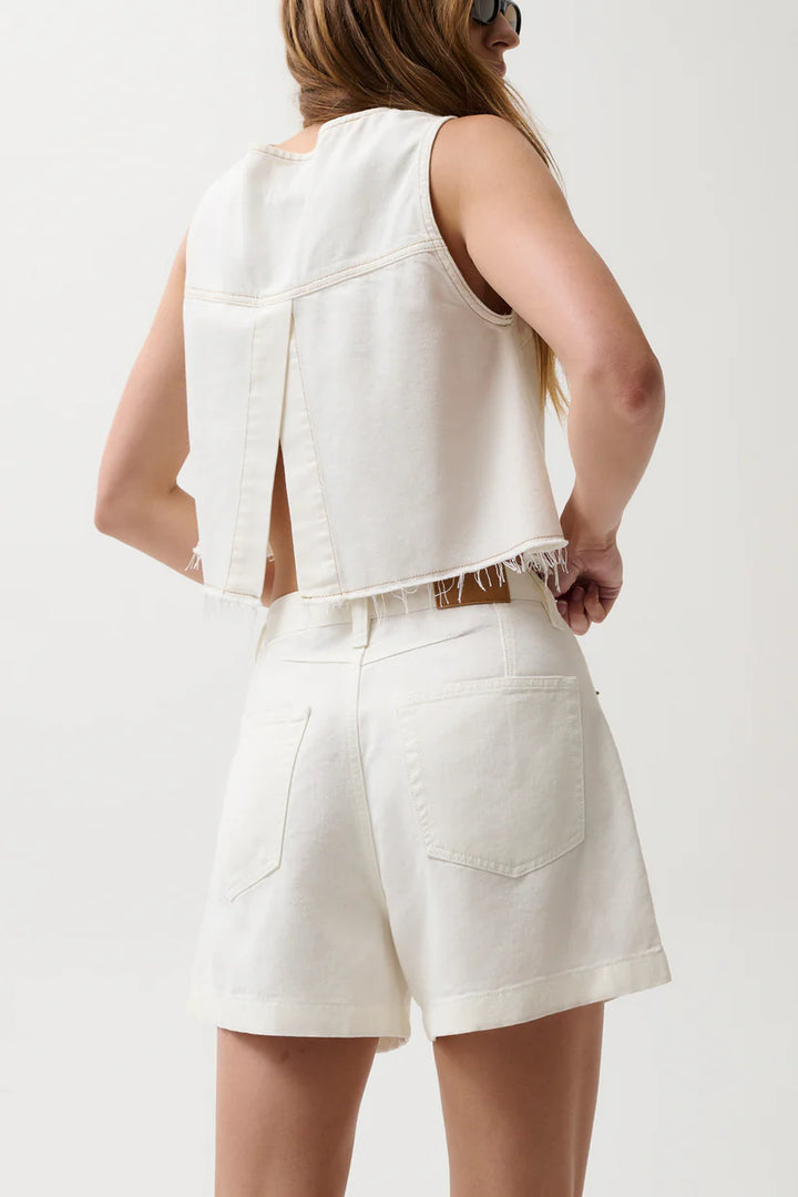 Pistola Kimora High Rise A-Line Short in Egret, white denim, high rise back view with patch pockets and cuffed hem, paired with cropped denim tank