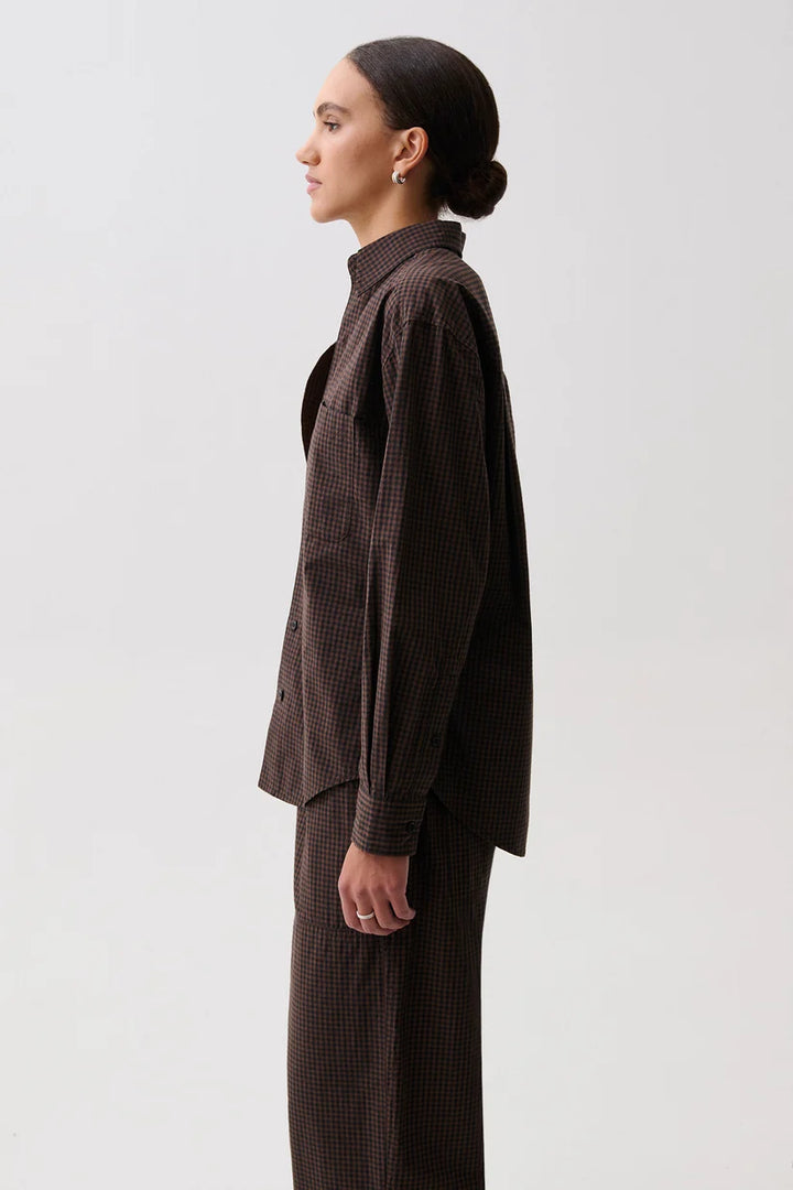 Pistola Mila Long Sleeve Button Down, side profile view, showing point collar, chest pocket, and shirt silhouette.