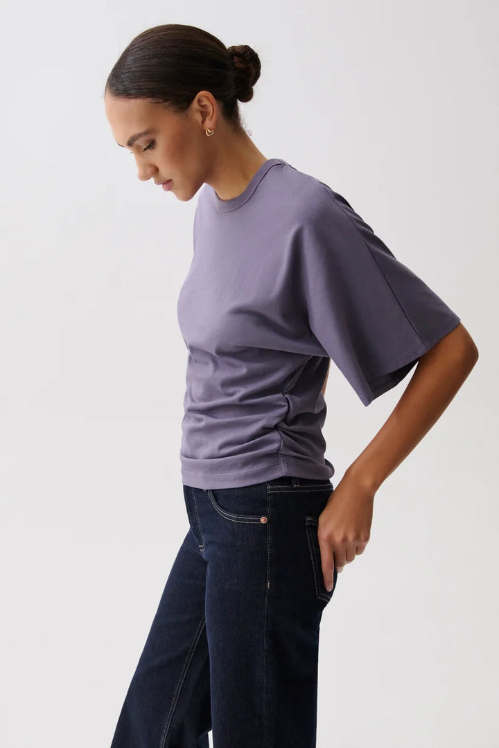 Pistola Veronica Kimono Sleeve Fitted Tee in Acai, side profile view, showing fitted waist and dramatic sleeve silhouette.
