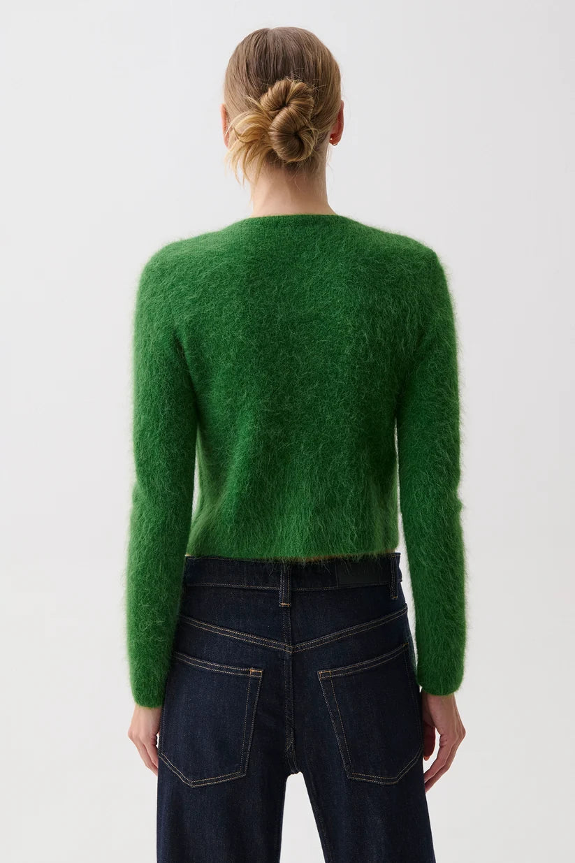 Pistola Yara Alpaca Blend Shrunken Cardigan in Vivid Moss, back view on model, showing fuzzy brushed texture, slim long sleeves, and cropped hem at the jeans waistband.