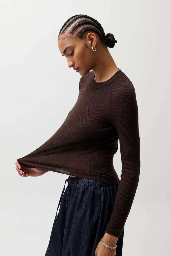 Pistola Juno Feather Weight Sweater Mocha — side view, pulling hem to show sheer knit