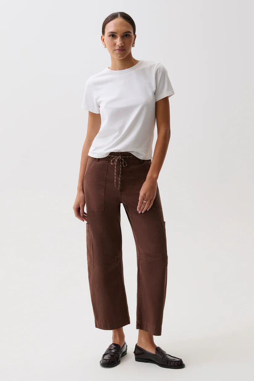 Front on-model — Pistola Sabrina Curved Utility Pants in Lindt, high-rise brown utility pants with rope drawstring, worn with white tee