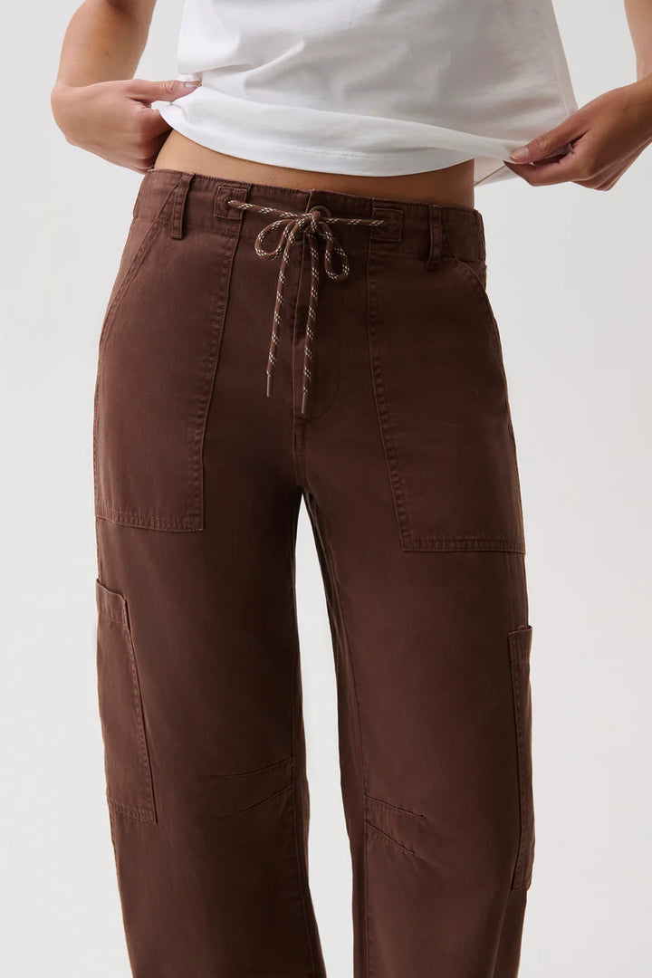 Detail close-up — Pistola Sabrina Curved Utility Pants in Lindt, contrast rope drawstring and patch pocket detail