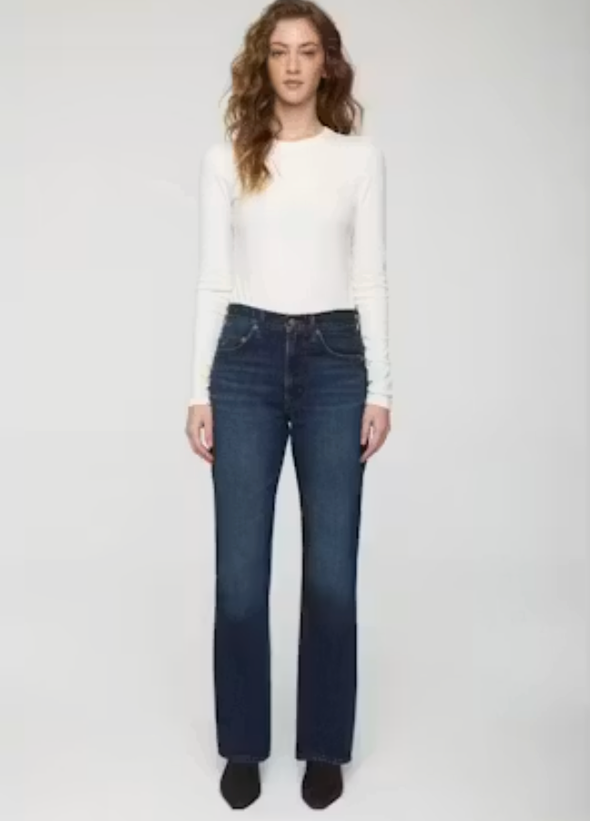 Pistola Dakota High Rise Authentic Bootcut jeans in Skyscraper wash, front view, styled with white long-sleeve top, high-rise waist and bootcut leg visible.