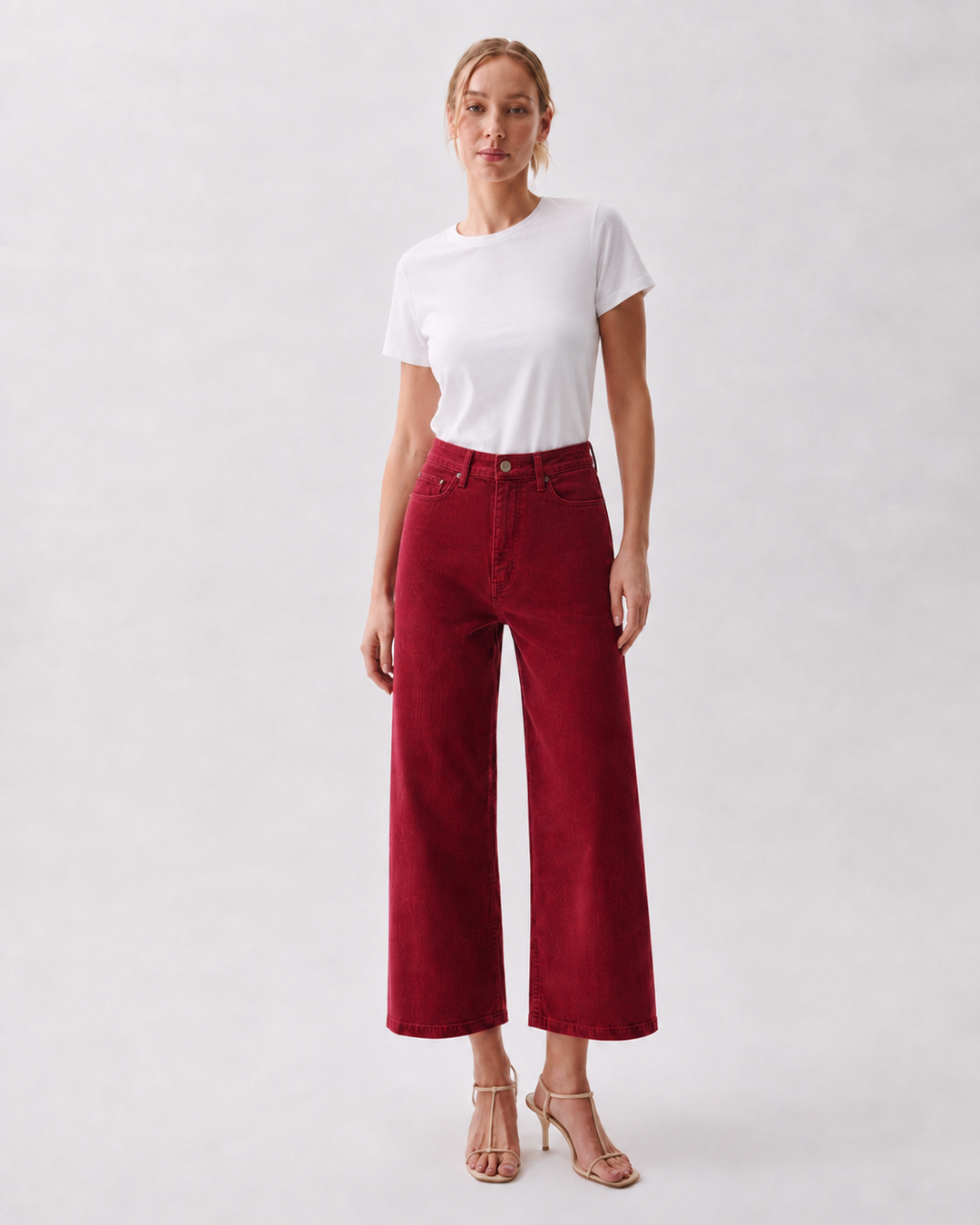 Pistola Penny Crop High Rise Wide Leg Corduroy in Deep Crimson, front view, model wearing crimson wide-leg cropped corduroy pants with white tee and nude heels.