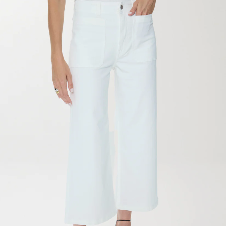 White wide-leg pants worn by a person on a white background