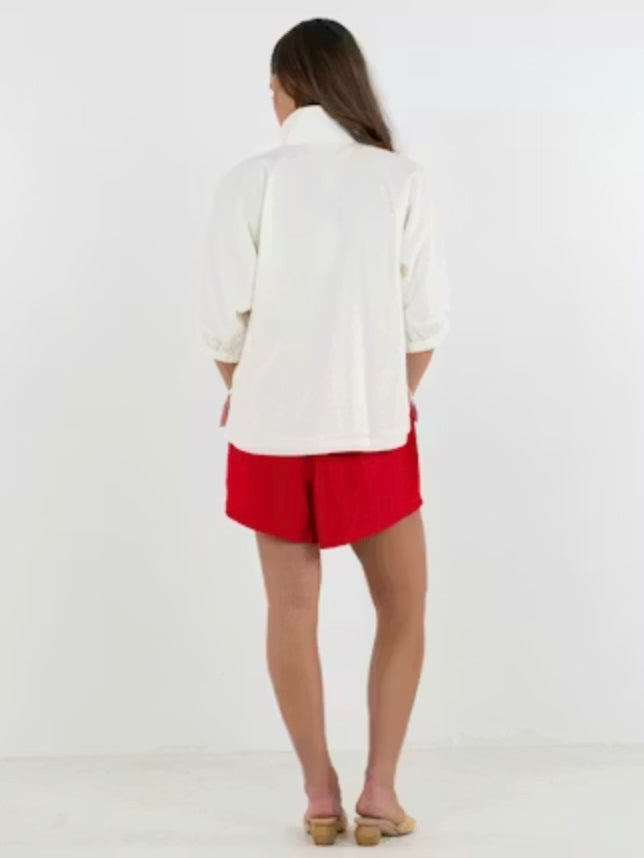 Emily McCarthy Poppy Top in Trellis ivory cotton with geometric taupe embroidery panel and open V-collar - back