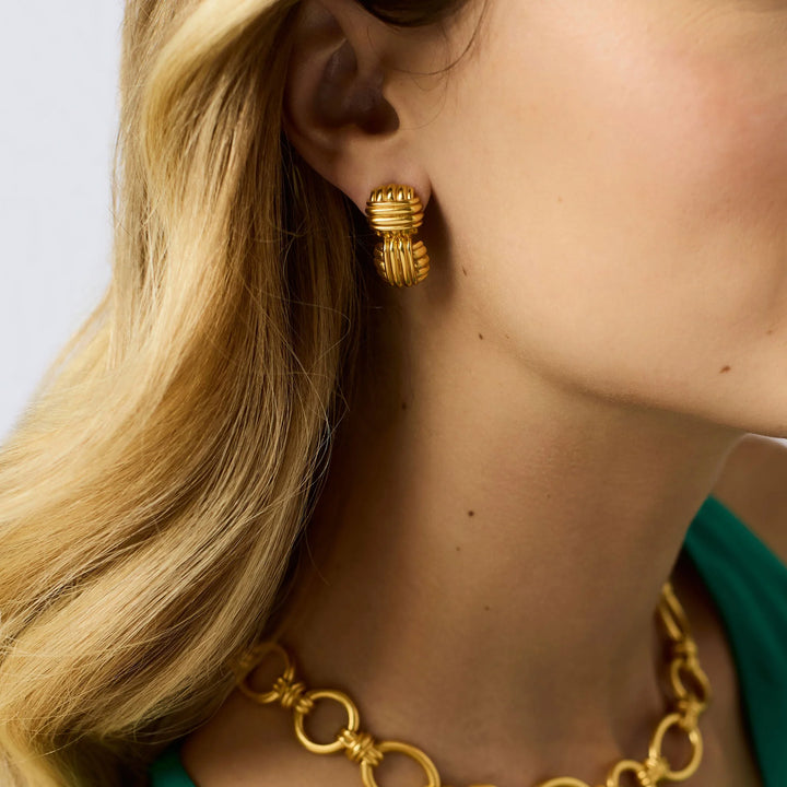 Julie Vos Portofino Midi Earring in Gold worn at the ear, polished 24K gold plate close-to-lobe silhouette