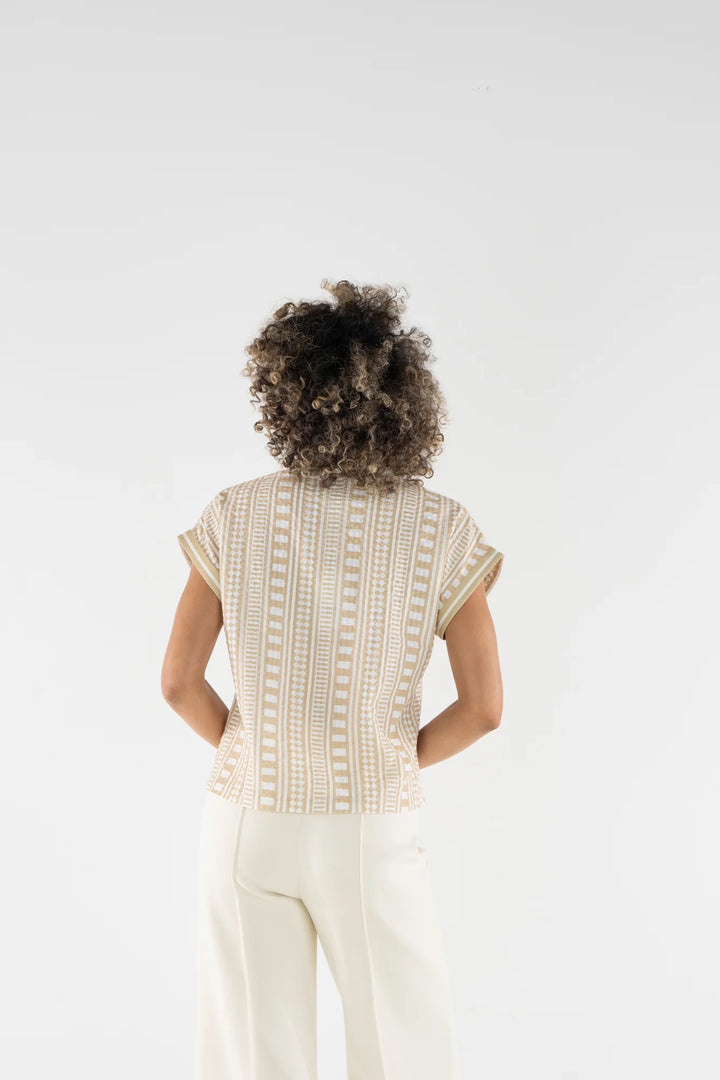 Back view of Emily McCarthy Riviera Top in Piazza Stripe showing dolman sleeve silhouette and tonal cuff trim detail.
