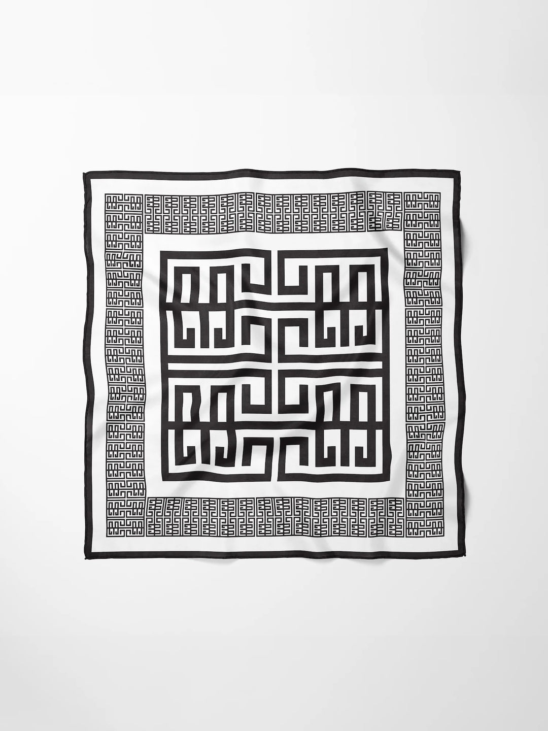 Emily McCarthy Hand-Stitched Silk Scarf in Black Greek Key — flat lay, full pattern and border visible