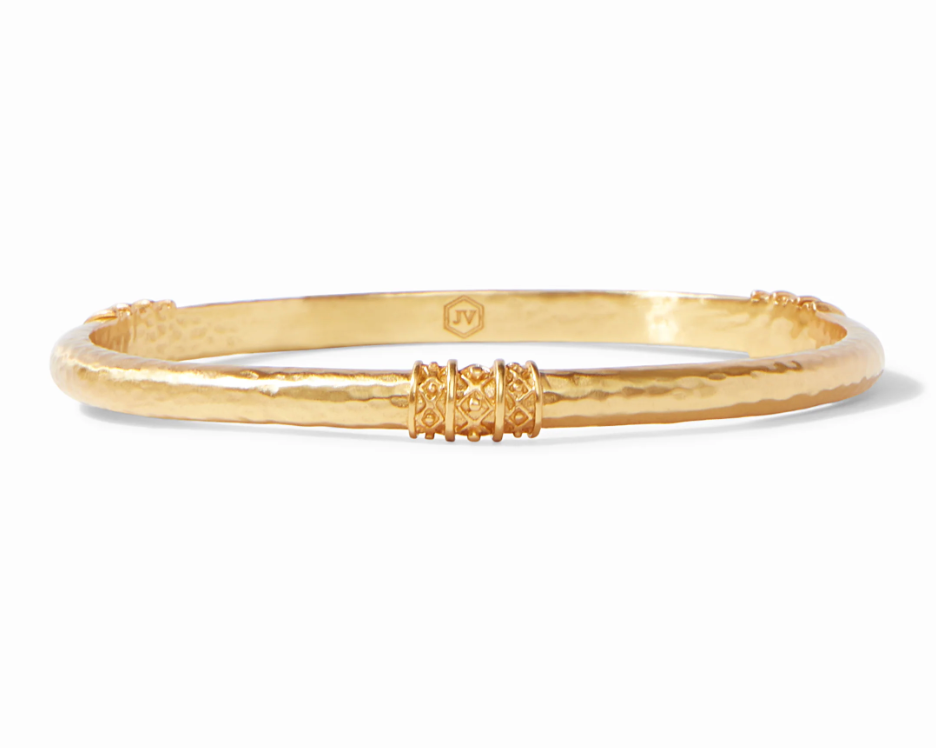 Julie Vos Catalina Bangle in 24K gold plate, shown on wrist — slim hammered band with bead-in-diamond detail.