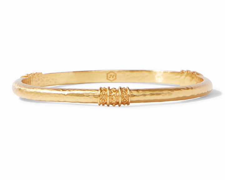 Julie Vos Catalina Bangle in 24K gold plate, shown on wrist — slim hammered band with bead-in-diamond detail.