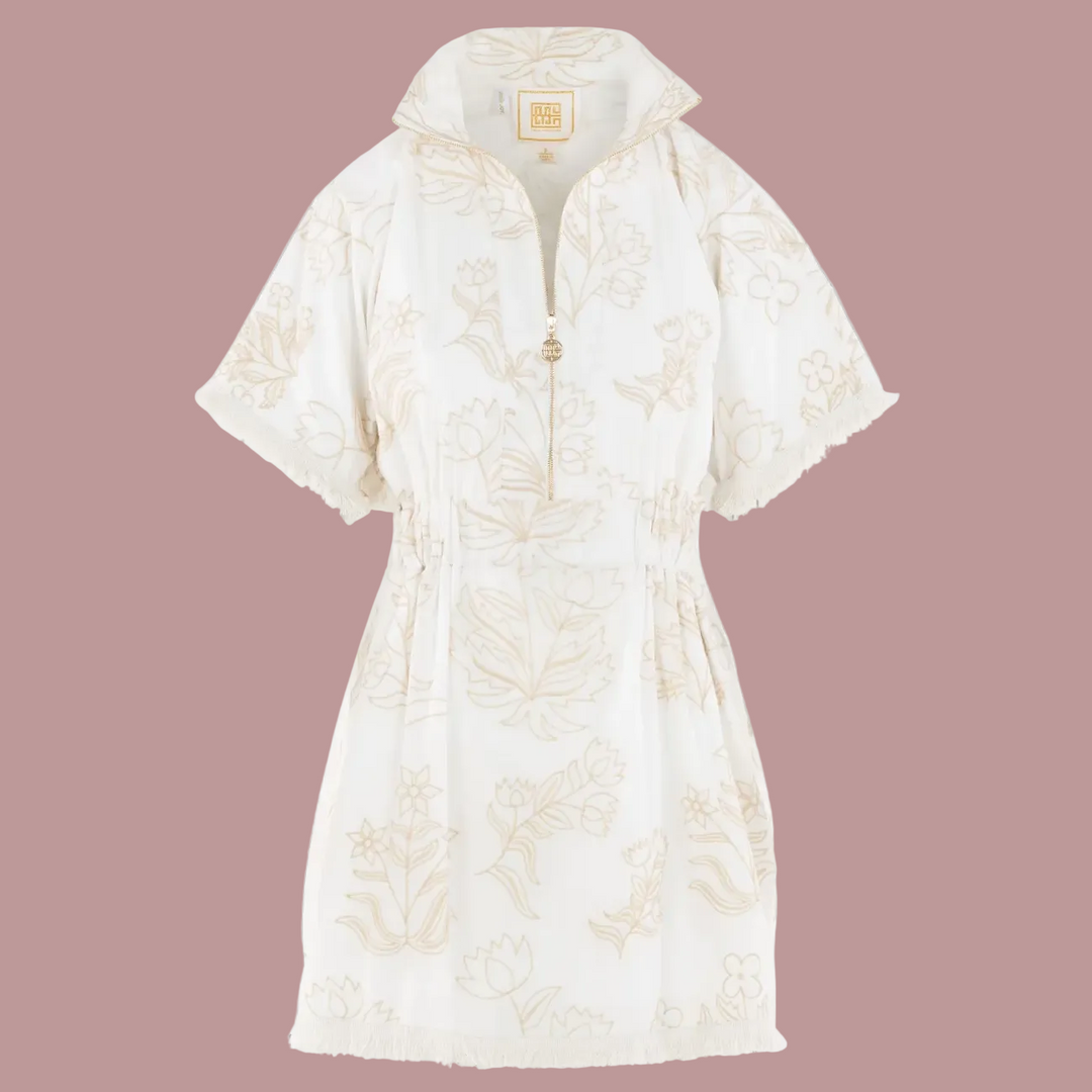 White lace dress with a hood on a gray background