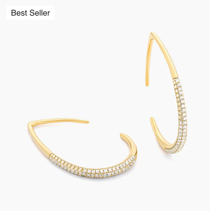 Ella Stein Drop By Anytime Hoop Earrings in gold — flat lay pair showing open teardrop silhouette, pointed apex, and pavé natural diamond setting along lower curve.