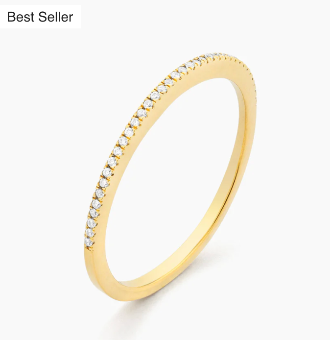 Ella Stein For All Eternity Stack Ring in gold — angled product shot showing slim band profile, half-eternity pavé natural diamond setting along upper arc, and gold plated finish.