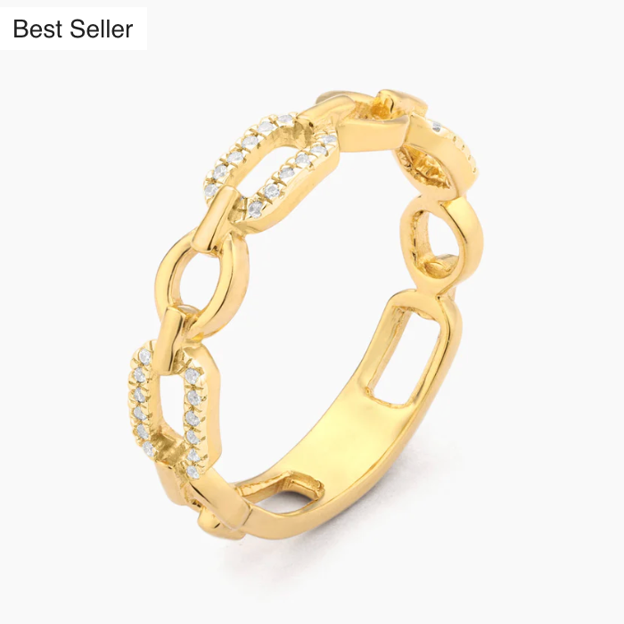 Ella Stein Linked Forever To You Stack Ring in gold — angled product shot showing full curb chain link band with alternating polished and pavé natural diamond-set links in gold plating.