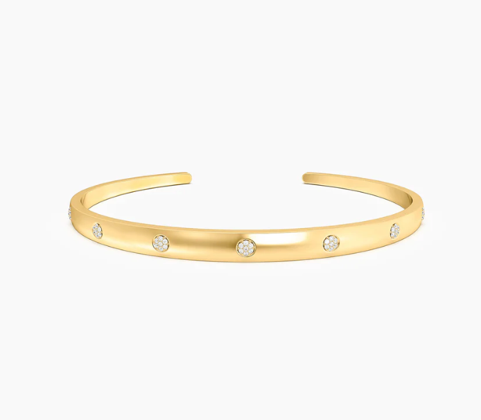 Ella Stein Lucky 7 Cuff Bracelet in gold — front flat lay showing solid open cuff with seven evenly spaced bezel-set natural diamond stations and high-polish finish in gold plating.