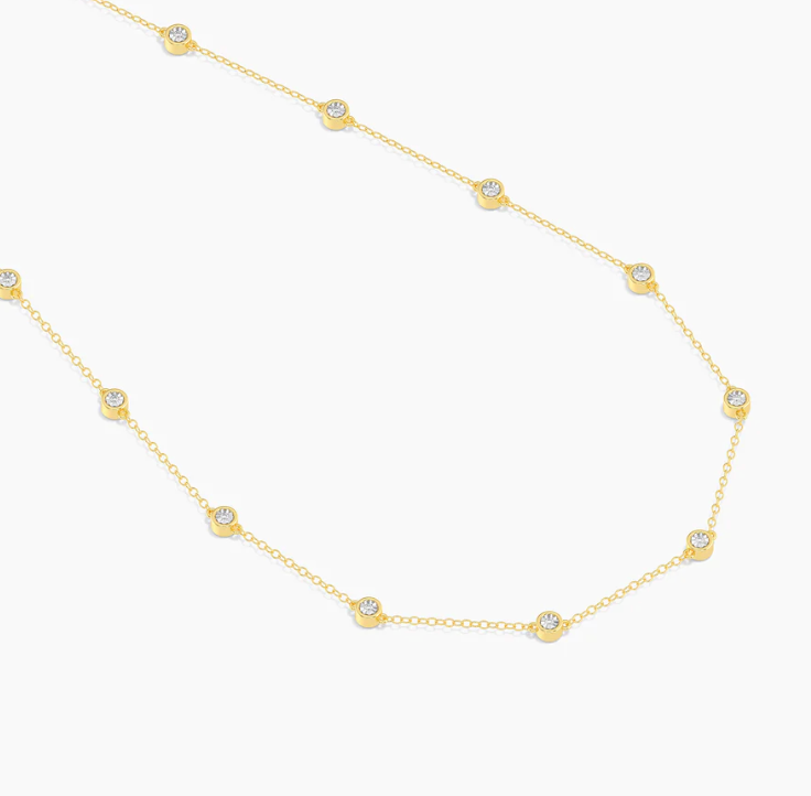 Ella Stein In The Loop Chain Necklace in gold, full chain view showing all bezel-set natural diamond stations on fine cable chain, white background.