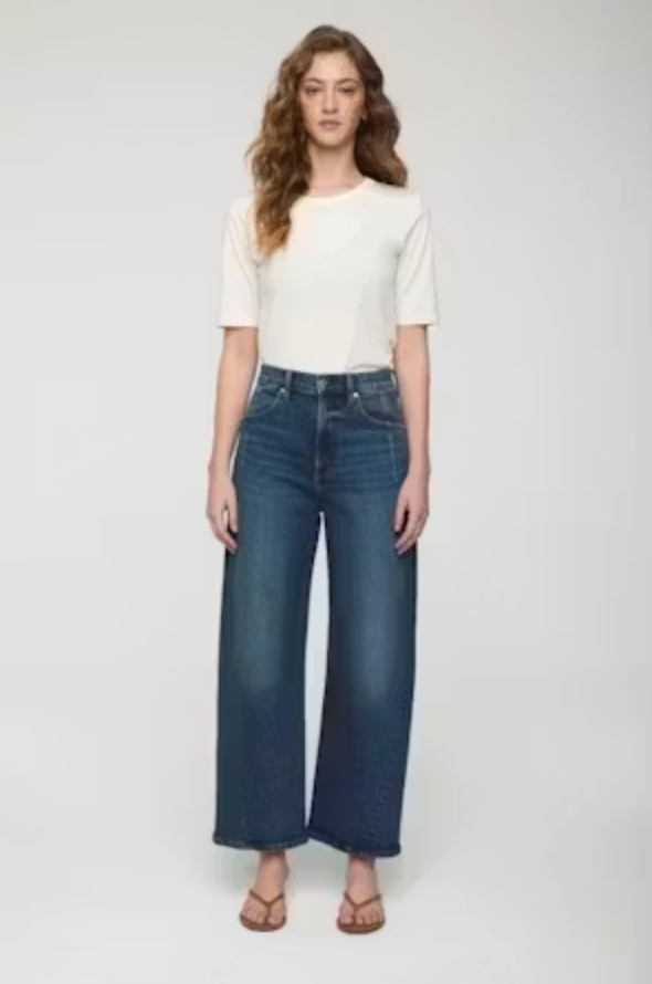 Front on-model — Pistola Kyra Ankle High Rise Bowed Jean in Cosmic, high-rise wide-leg denim with bowed silhouette, worn with white tee