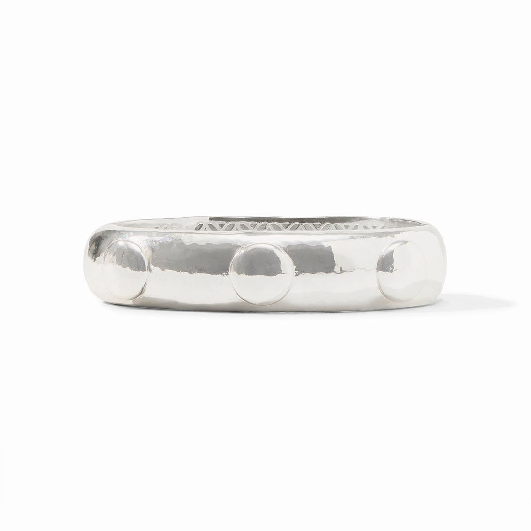 Julie Vos Solara Hinge Bangle in silver plate with hammered finish, dome stud accents, and engraved interior lattice pattern.