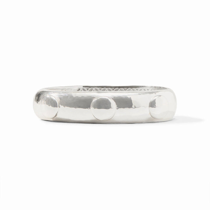 Julie Vos Solara Hinge Bangle in silver plate with hammered finish, dome stud accents, and engraved interior lattice pattern.